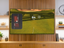 Golf simulator screen displaying a golf course with digital readouts 